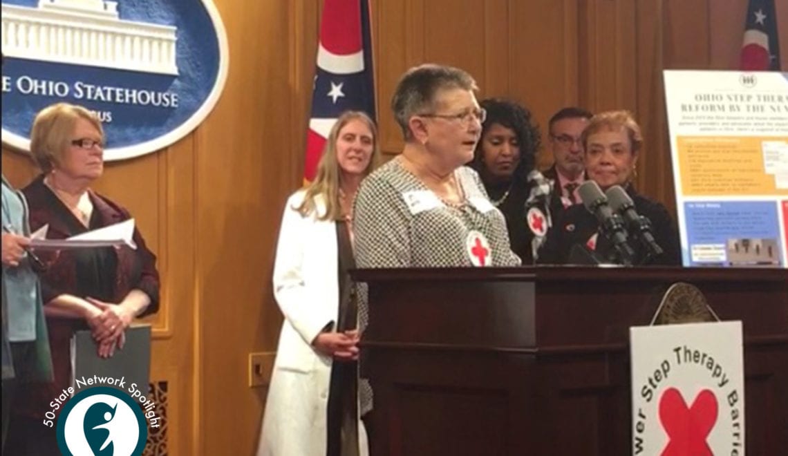 Photo of Judy Nagy Patient Advocate speaking at a podium