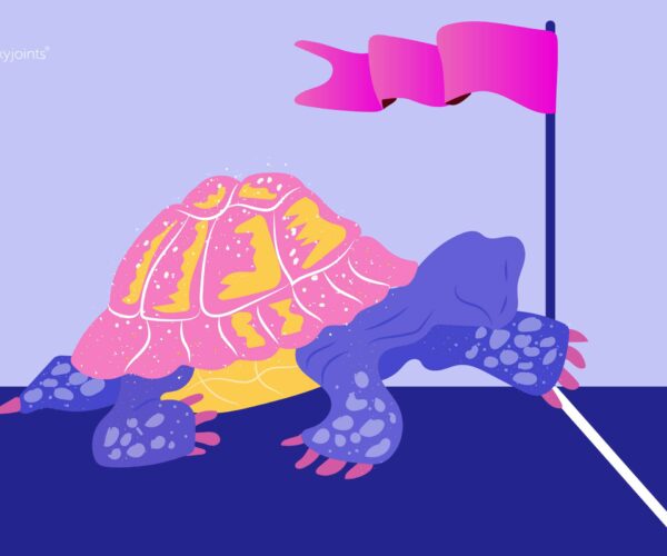cartoon shows a turtle cross a finish line