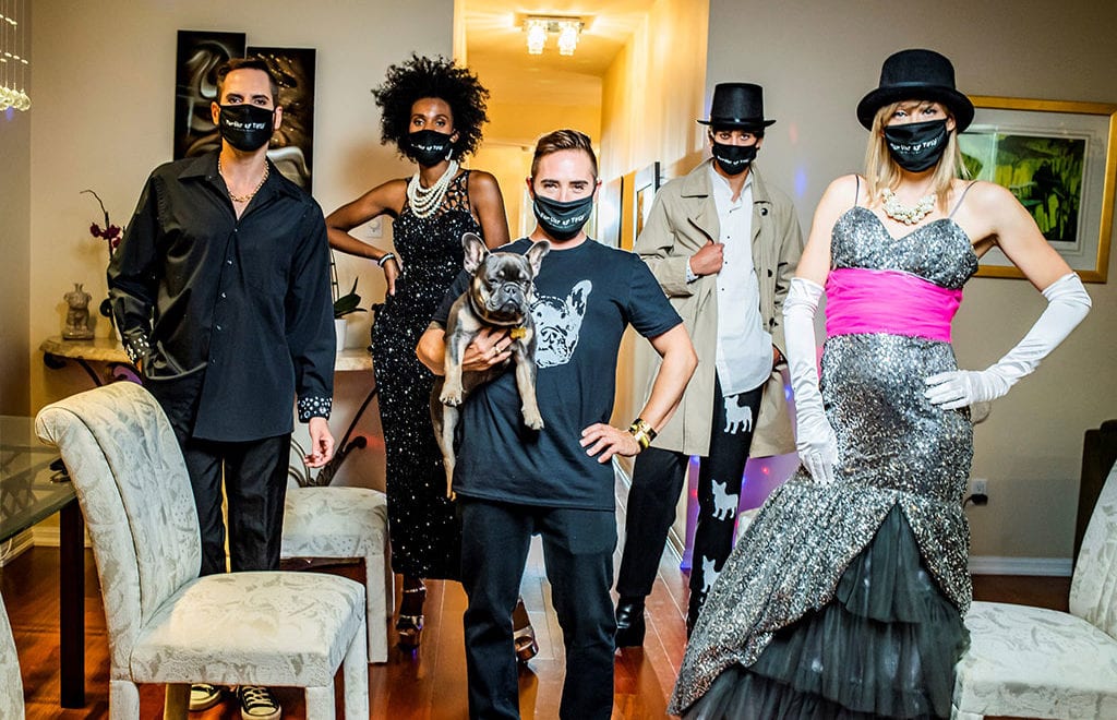 Fashion models standing in a room with cloth masks