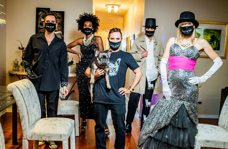 Fashion models standing in a room with cloth masks