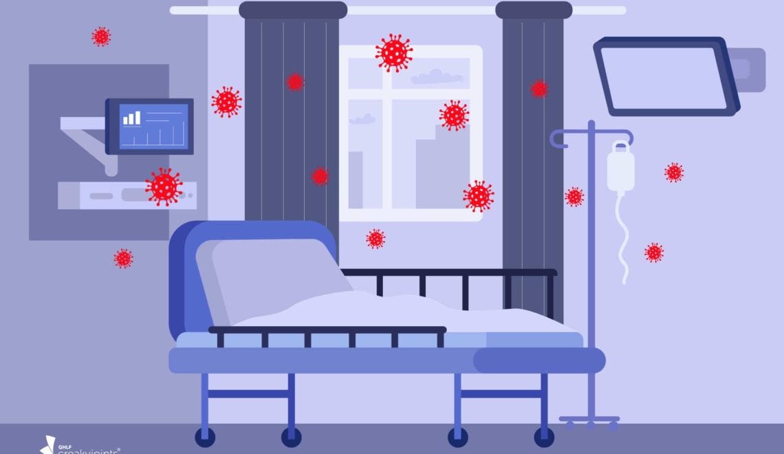 Cartoon image shows an empty hospital bed surrounded by red COVID particles