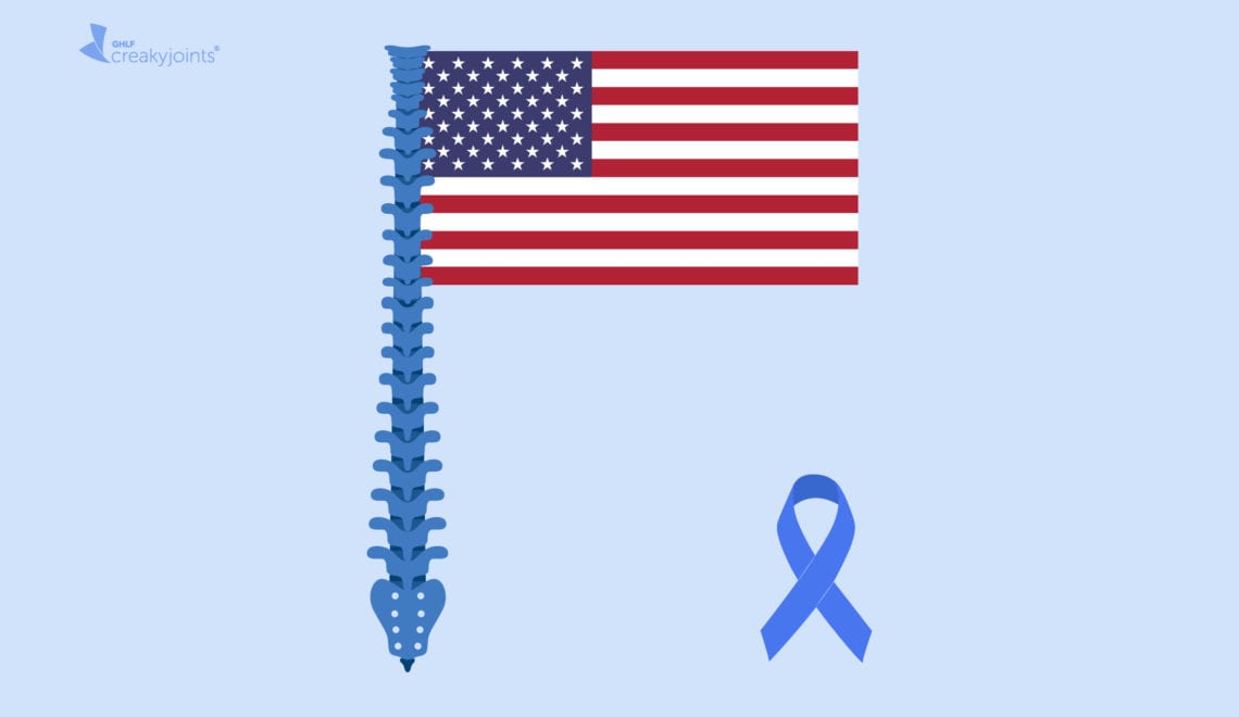 An American flag lays on a light blue background. The pole is a spine that has inflammation from axSpA. To the right of the flag is the blue spondyloarthritis awareness ribbon.