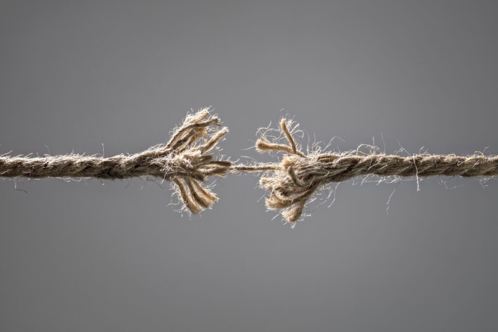 Image of frayed rope about to break concept for coping with chronic illness