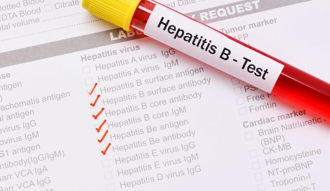 Photograph of a blood sample with form for testing for hepatitis B