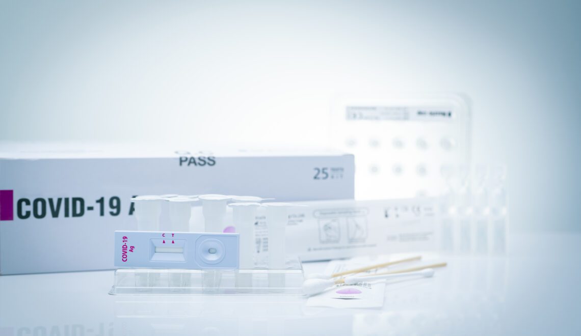 Photo of a home test kit for COVID-19 for an article about what to know about home testing if you're immunocompromised