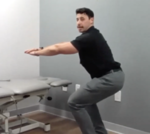 Hospital for Special Surgery (HSS) physical therapist Zack Rogers doing squats