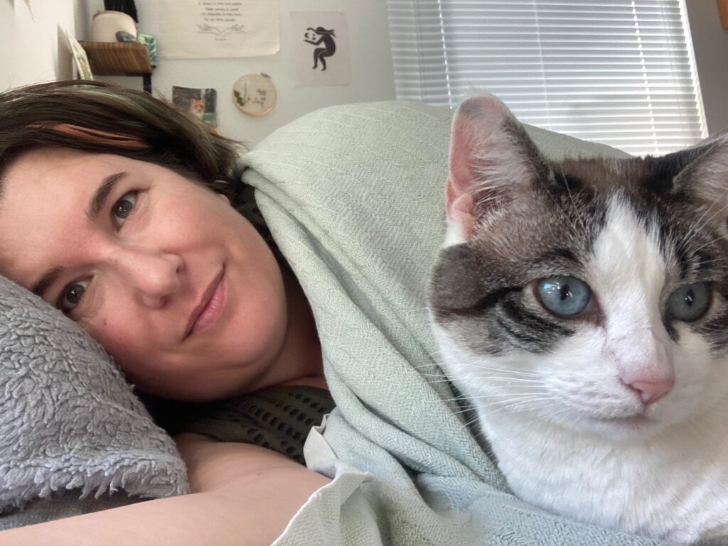photo of patient advocate Angie Ebba with cat