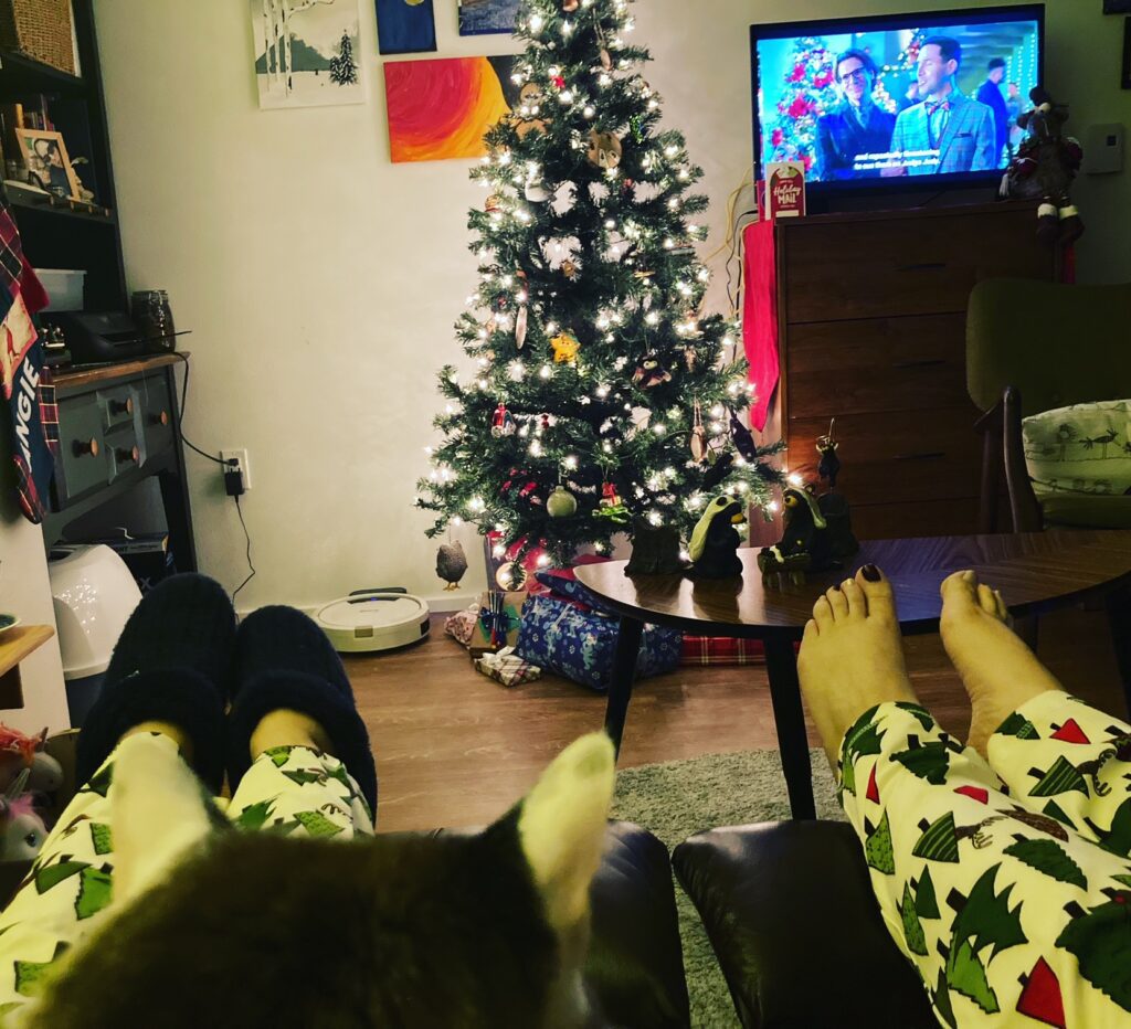 Angie Ebba with her feet up watching holiday movies
