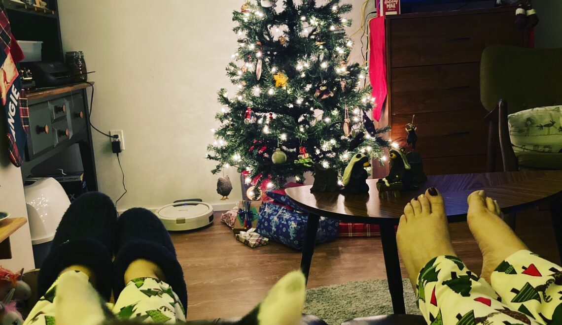 Angie Ebba with her feet up watching holiday movies