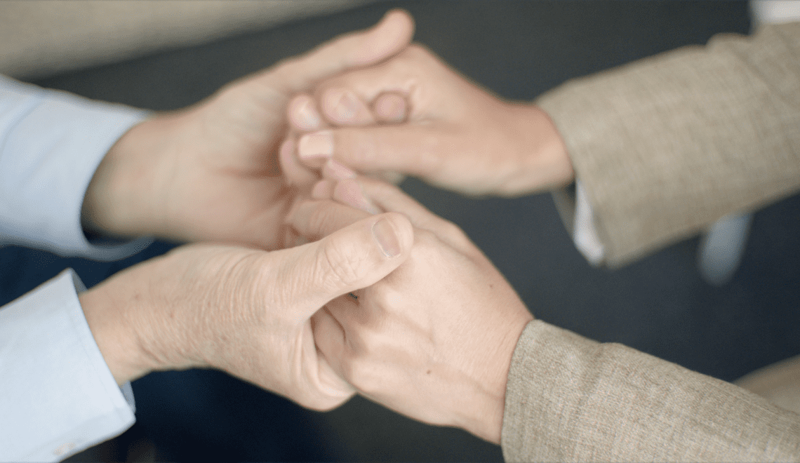 Image of hands, representing caregiving