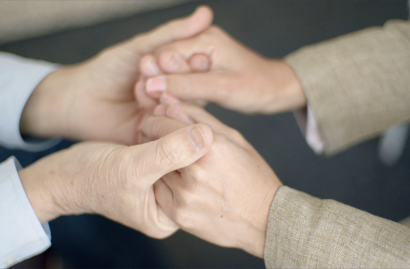Image of hands, representing caregiving