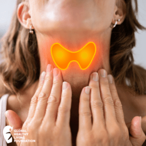 Woman touching her neck where her thyroid is